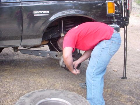 1988 Ford Bronco - Me fixing stupid wheel bearings.