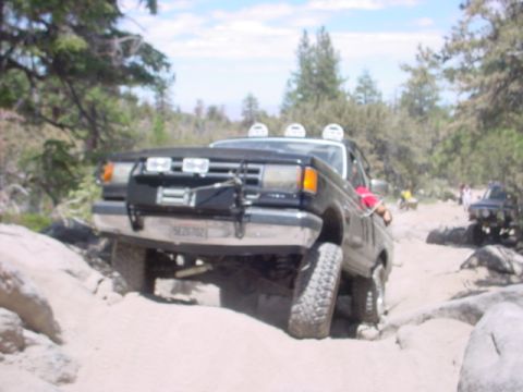 1988 Ford Bronco - This 1988 Ford Bronco is tackling a challenging off-road course.