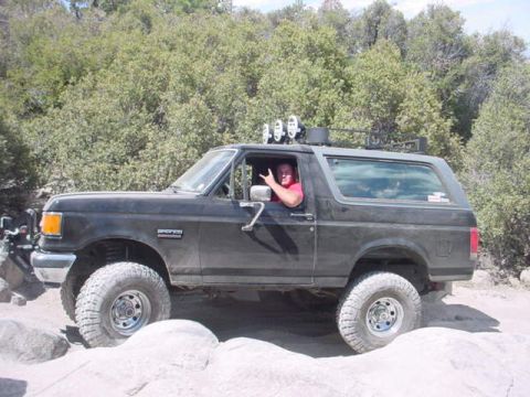 1988 Ford Bronco - This 1988 Ford Bronco is equipped for off-road adventures with its lifted suspension and roof rack.