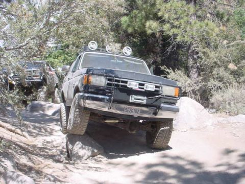 1988 Ford Bronco - This 1988 Ford Bronco is tackling a challenging off-road course.
