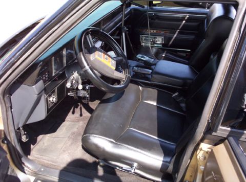 1991 Ford Crown Victoria LTD - Interior view of a car, showing the dashboard, steering wheel, and seats.