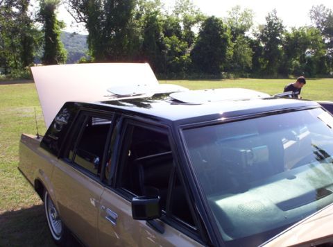 1991 Ford Crown Victoria LTD - This sedan's body style suggests a 1980s model, not a 1991 Ford Crown Victoria LTD.