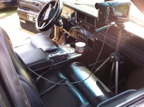 1991 Ford Crown Victoria LTD - Interior of a 1991 Ford Crown Victoria LTD, set up with a camcorder for filming.
