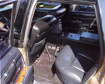 1991 Ford Crown Victoria LTD - Interior view of a car showing the front and rear seats, dashboard, and door panels.