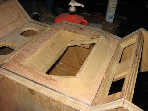 1995 Ford Bronco - Putty'd the carp out of the TV area, at 6 bucks for a big can it sure is cheaper than fiber-glass.