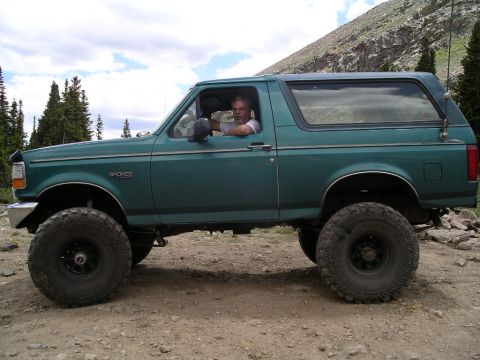 1996 Ford Bronco - Dave and Bronco at top by the lake