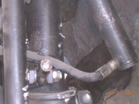 1994 Ford Bronco - A close-up view of vehicle suspension components, with a date stamp of July 11, 2004 visible in the corner.