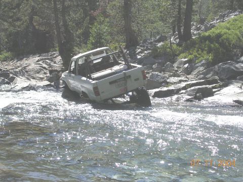 1994 Ford Bronco - A toy that was running parts back to another broken down jeep was familiar with the trail, and showed us an easier way to get thru the wate…
