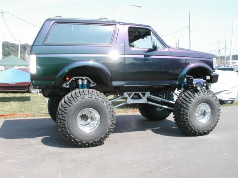 1994 Ford Bronco - This modified Ford Bronco features an extreme lift kit and oversized off-road tires.