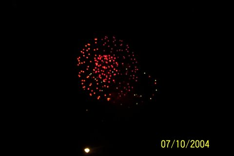 1979 Ford Bronco - A fireworks display lights up the night sky, with a date overlay indicating July 10, 2004.