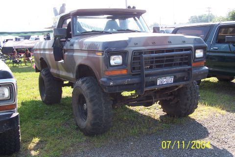 1979 Ford Bronco - This modified Ford Bronco has a camouflage paint job and appears to be from the late 1970s.