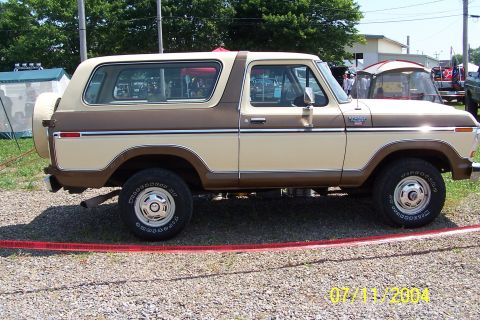 1979 Ford Bronco - This two-tone 1979 Ford Bronco is seen from the side, a spare tire mounted on the rear tailgate.