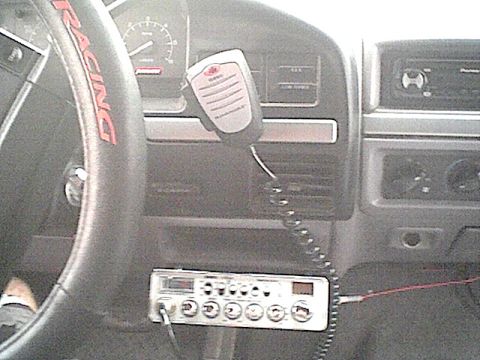 1994 Ford Bronco - Interior view of a 1994 Ford Bronco, a CB radio and microphone mounted on the dashboard.