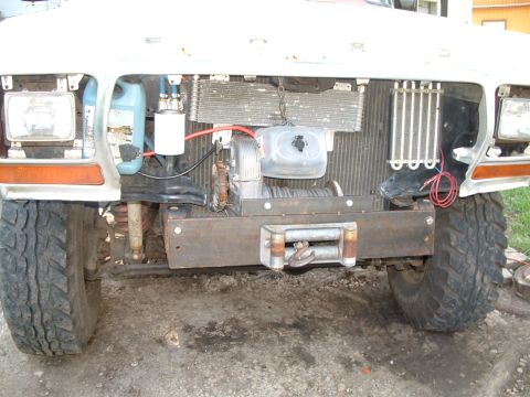1979 Ford Bronco - Front view of a modified 1978 Ford Bronco, showing its winch and cooling system modifications.