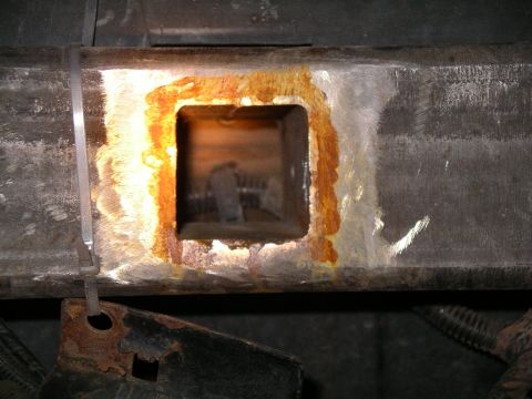 1996 Ford Bronco - Picture of front side of bumper around the reciever hitch. Looks like someone needs to do a little painting...