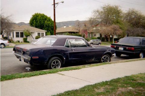 1968 Ford Mustang - I pushed out the rear quarter panel with a bottle & sissor jack. It looks much better now. (Still ugly tho.)