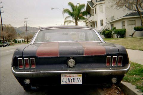 1968 Ford Mustang - I dont know what the guy was thinking. Red stripes!??.......