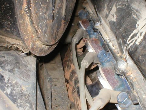 1978 Ford Bronco - Engine bay detail with spark plug wires and exhaust manifold visible.