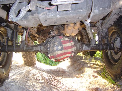 1993 Ford Bronco - The rear differential cover of a vehicle is decorated with an American flag design.