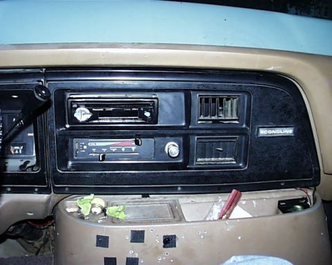 1988 Ford E250 - Interior view of a van dashboard, showing the stereo and air vents.
