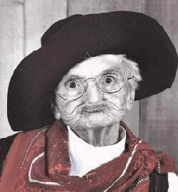 1993 Ford Bronco - An elderly woman with a large hat and glasses is pictured.