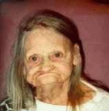 1993 Ford Bronco - Portrait of an elderly woman with distinctive facial features and long gray hair.