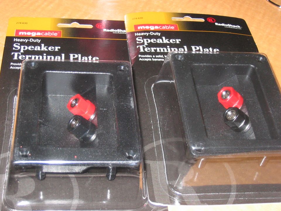Two packaged speaker terminal plates with red and black binding posts