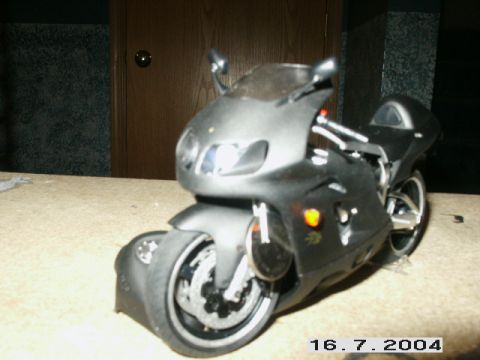 1998 Mercury Sable - Model motorcycle shown from the front on a carpeted surface. Watermark present in lower right.