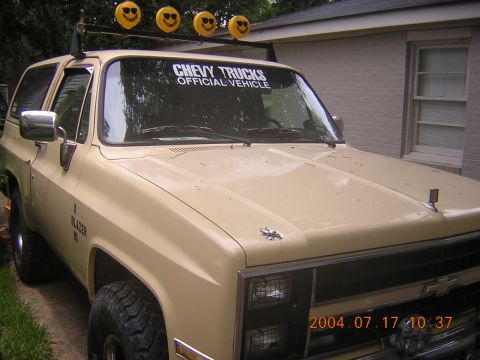 1984 Chevrolet Blazer - This 1984 Chevrolet K5 Blazer is equipped with a roof rack and four decorative smiley face lights.