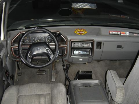 1988 Ford Bronco - The interior of a 1988 Ford Bronco shows the dashboard, steering wheel, and front seats.