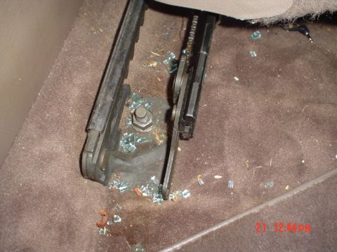 1993 Ford Taurus - upon further inspection there's still glass left from when my radio was stolen. : (