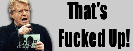 Jerry Springer speaking, pointing finger, holding card with text 'RE ER'. Large text 'That's Fucked Up!' overlays the image