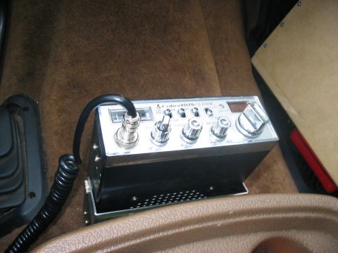 1988 Ford Bronco - Interior shot of a Cobra 25 LTD Classic CB radio installed in a vehicle.