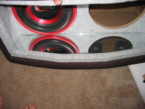 1988 Ford Bronco - A custom speaker box enclosure houses two Visonik subwoofers and two additional smaller speakers.