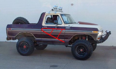 1979 Ford Bronco - Modified Ford Bronco with off-road upgrades, side view. Red lines are drawn on the door.
