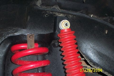 1996 Ford Bronco - Upper shock mount on ttb buckets. Not very pretty but solid axle spring buckets were hard to find when i was doing my swap. Plus these didn…