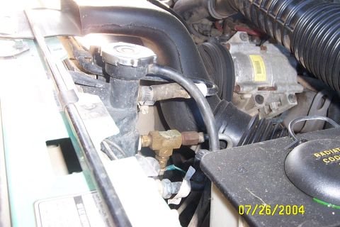 1996 Ford Bronco - This is the best place i found to put the trans temp sensor. I didnt want it in the pan really so i mounted it here. Never had any problems.