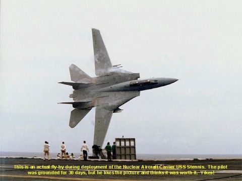 1988 Ford Bronco - An F-14 Tomcat performs a fly-by during deployment on a nuclear aircraft carrier.