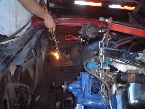 1967 Ford Galaxie - Removing a seized bolt from the old battery tray.