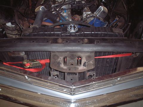 1967 Ford Galaxie - Front view of a 1967 Ford Galaxie engine bay, showing the radiator and chrome grille.