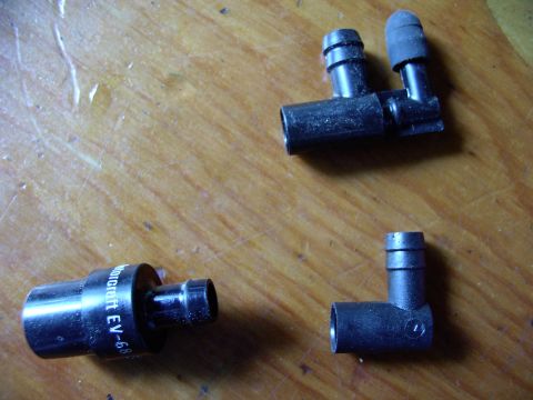 1986 Ford Bronco - That's a genuine Ford PCV valve. It's stock two port top(in top of pic) makes it difficult to fit under the upper intake on an EFI 5.0 engi…