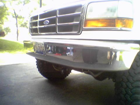 1993 Ford Bronco - Front view of a 1992 Ford Bronco, showing the grille and bumper details.