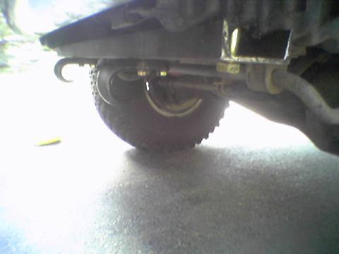 1993 Ford Bronco - Undercarriage view showing suspension parts and a tire.