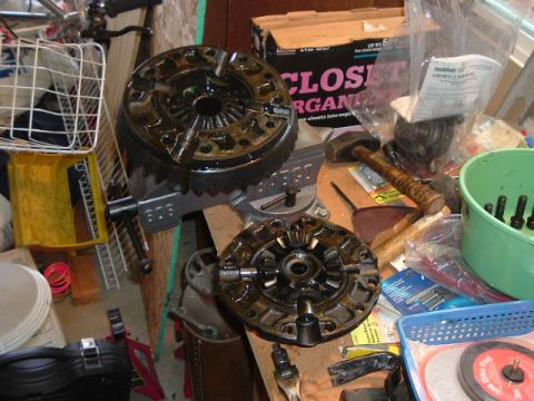 1989 Ford Bronco - Differential components are laid out on a workbench, suggesting a repair or installation process.