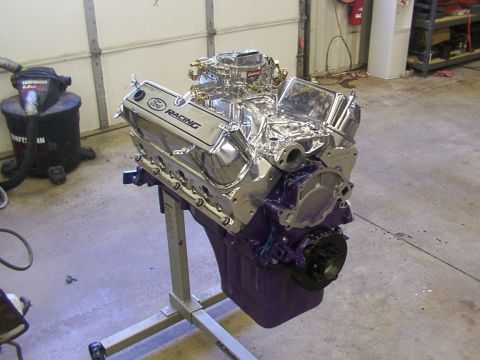 1978 Ford Mustang II - A highly polished Ford Racing engine is displayed on a stand, ready for installation.