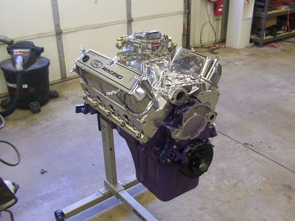 Chrome Ford Racing engine on stand