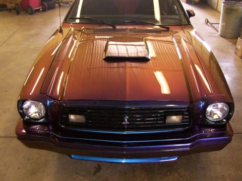 1978 Ford Mustang II - Front view of a 1978 Ford Mustang II, a hood scoop and custom paint job.