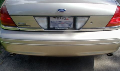 2000 Ford Crown Victoria - Rear view of a 2000 Ford Crown Victoria showing the bumper, taillights, and license plate.