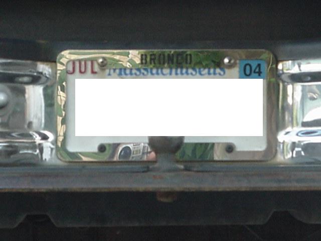 License plate frame with 'BRONCO' and 'Massachusetts' text