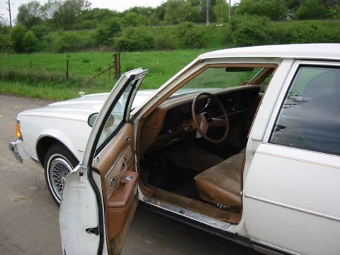 1979 Chevrolet Caprice - Interior view of a 1979 Chevrolet Caprice, showing the dashboard, steering wheel, and seats.